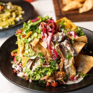A plate of mexican food on a table
