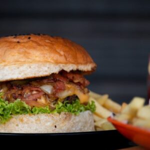 A sandwich and french fries on a plate