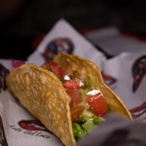 a close up of a taco on a plate