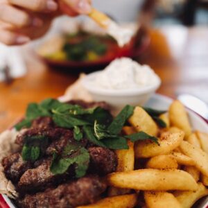 burger and fries on plate